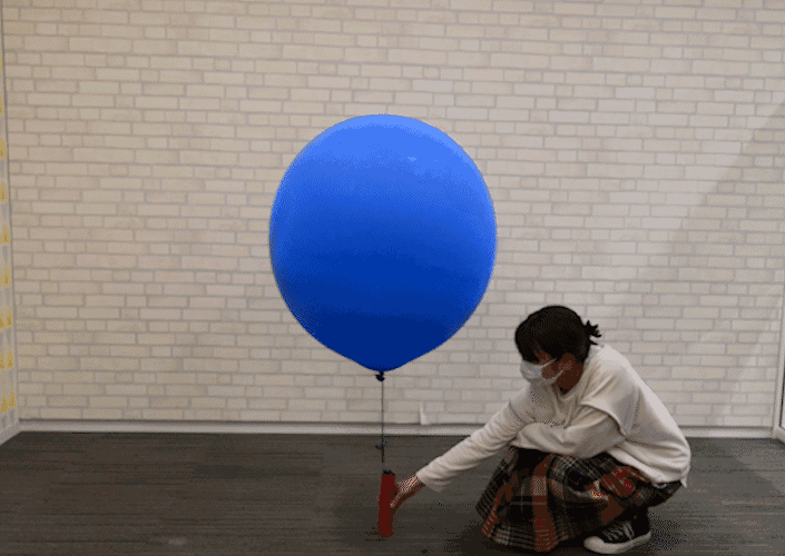 Gゼロポケットの傘を風船で浮かす
