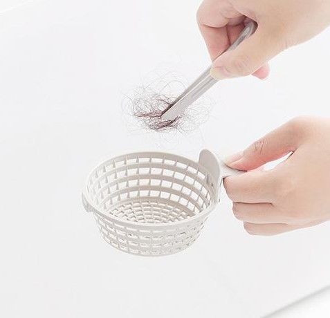 排水溝のゴミ取り